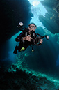 Diver_in_cave_L2569_07_St_Johns_small